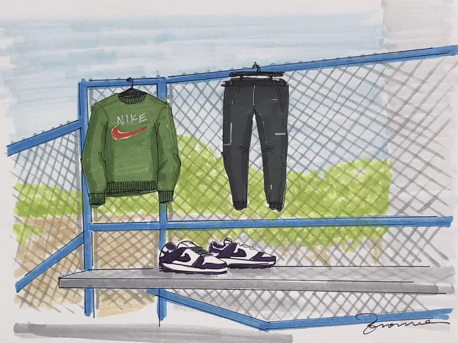 Illustrated Nike sweatshirt and sneakers on a chain-link fence